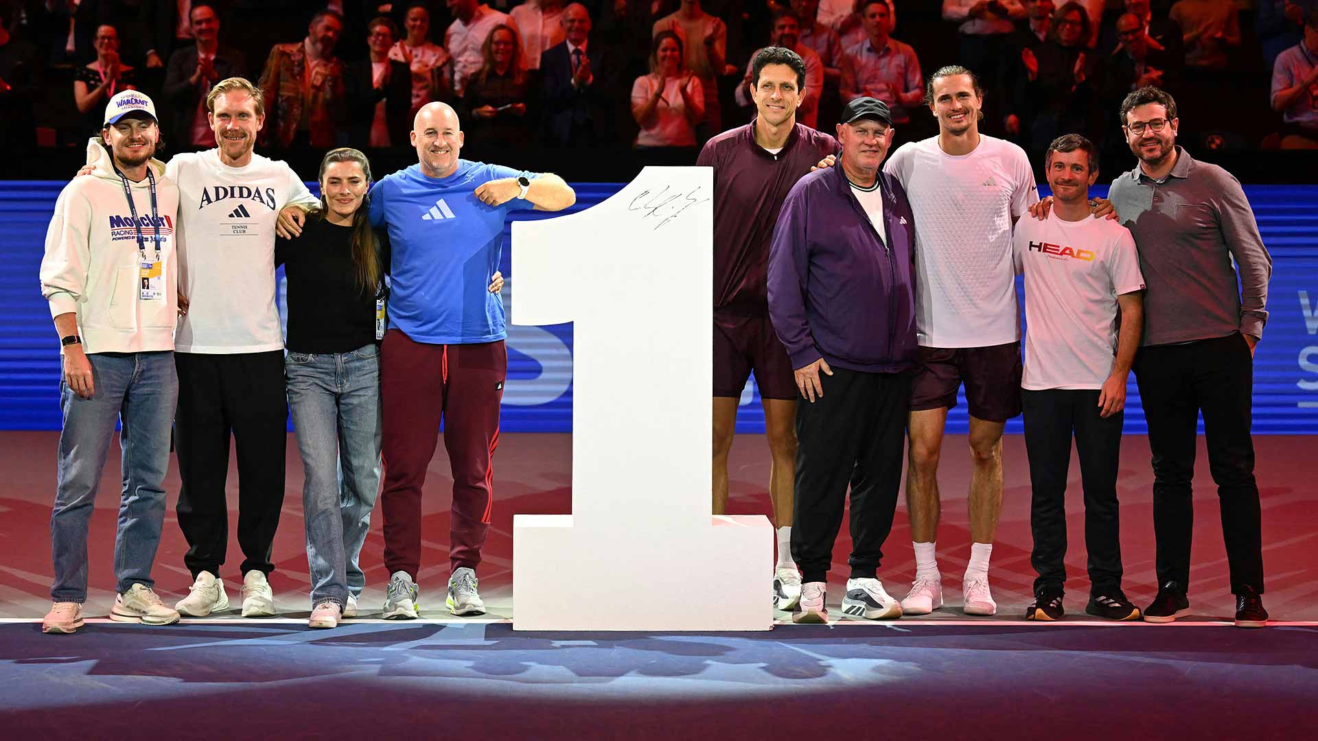 Alexander Zverev celebrates his upcoming ascension to World No. 1 on Thursday in Vienna with his team.