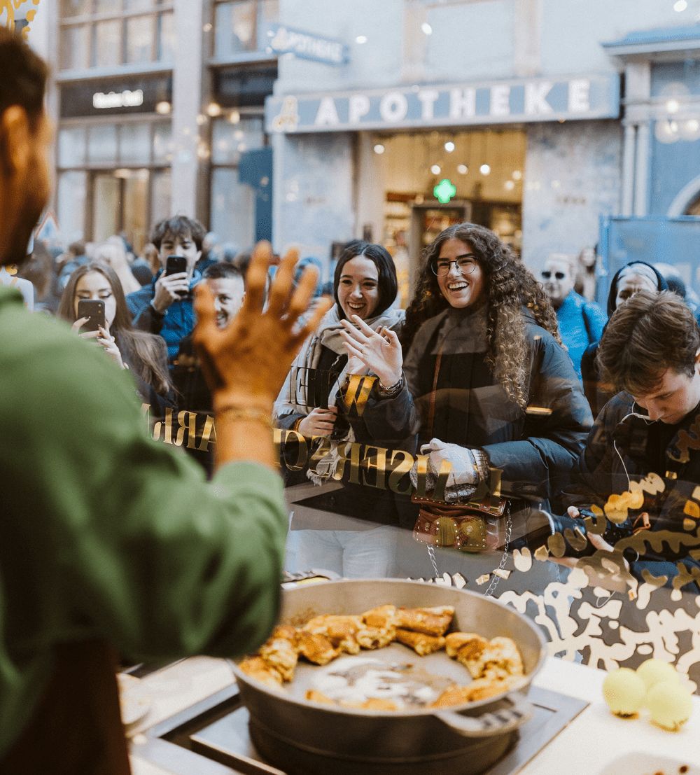 Grigor Dimitrov serving freshly prepared Kaiserschmarrn