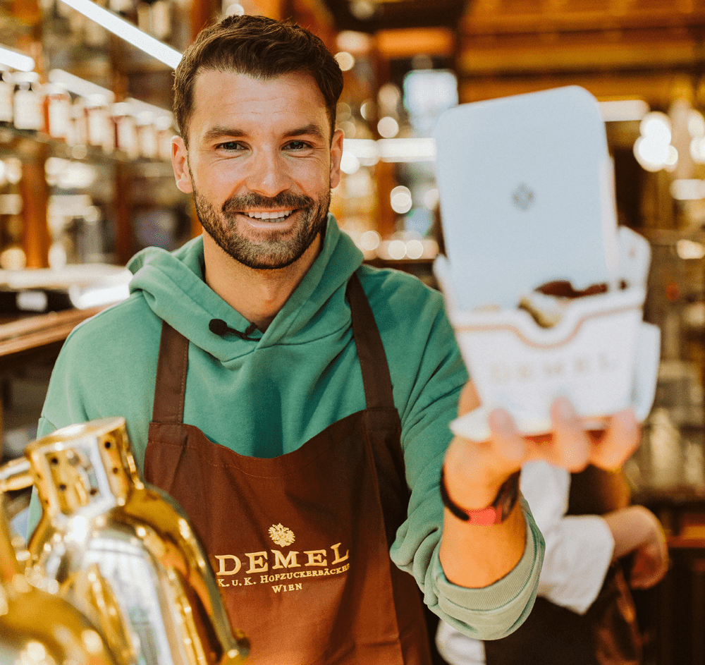 Grigor Dimitrov at the serving window at Demel
