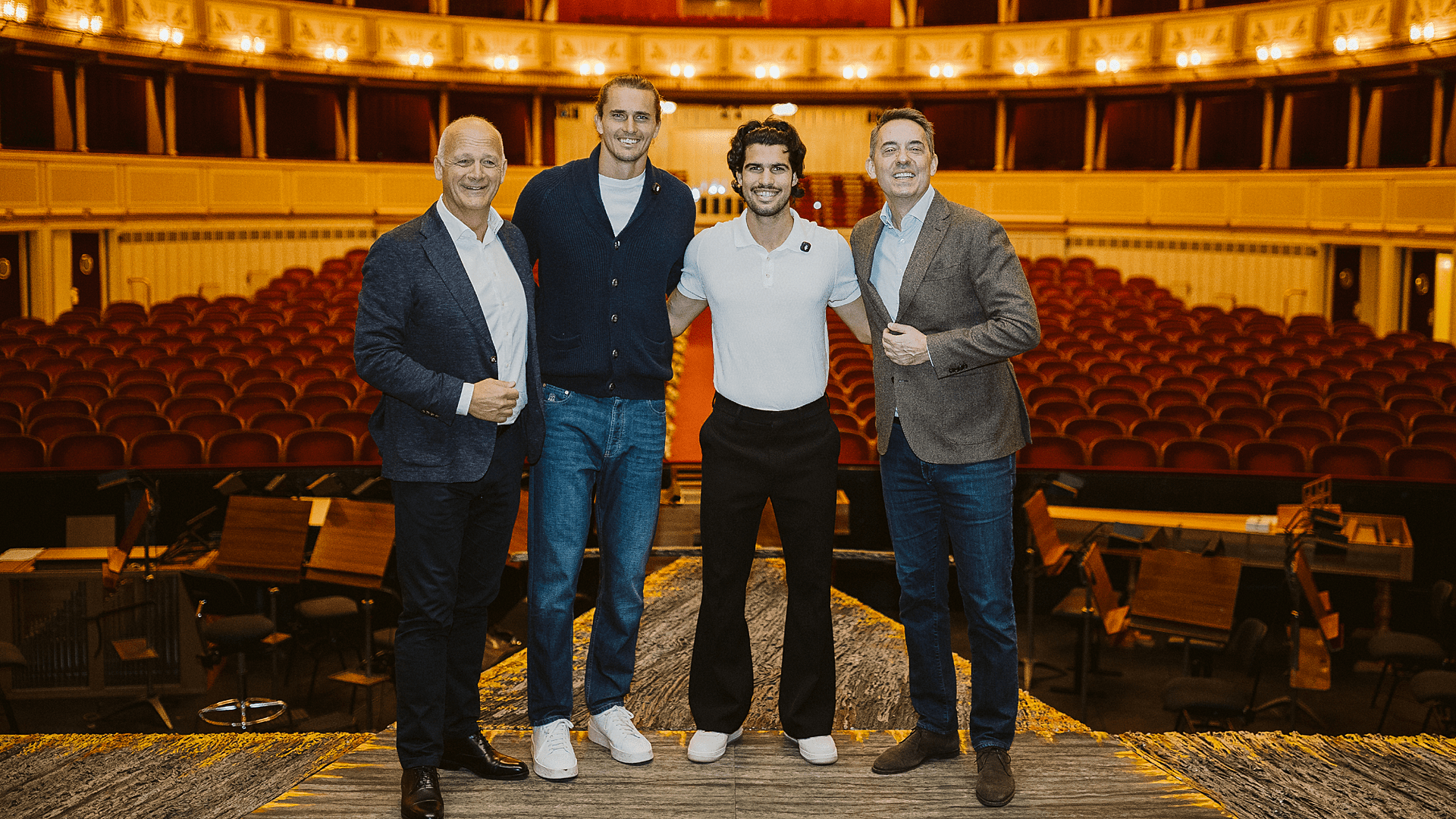 Alexander Zverev and Carlos Alcaraz with Bogdan Roscic and Herwig Straka on the stage of the Vienna State Opera